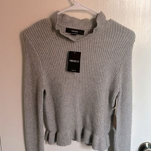 Light dark grey Sweater size small never used